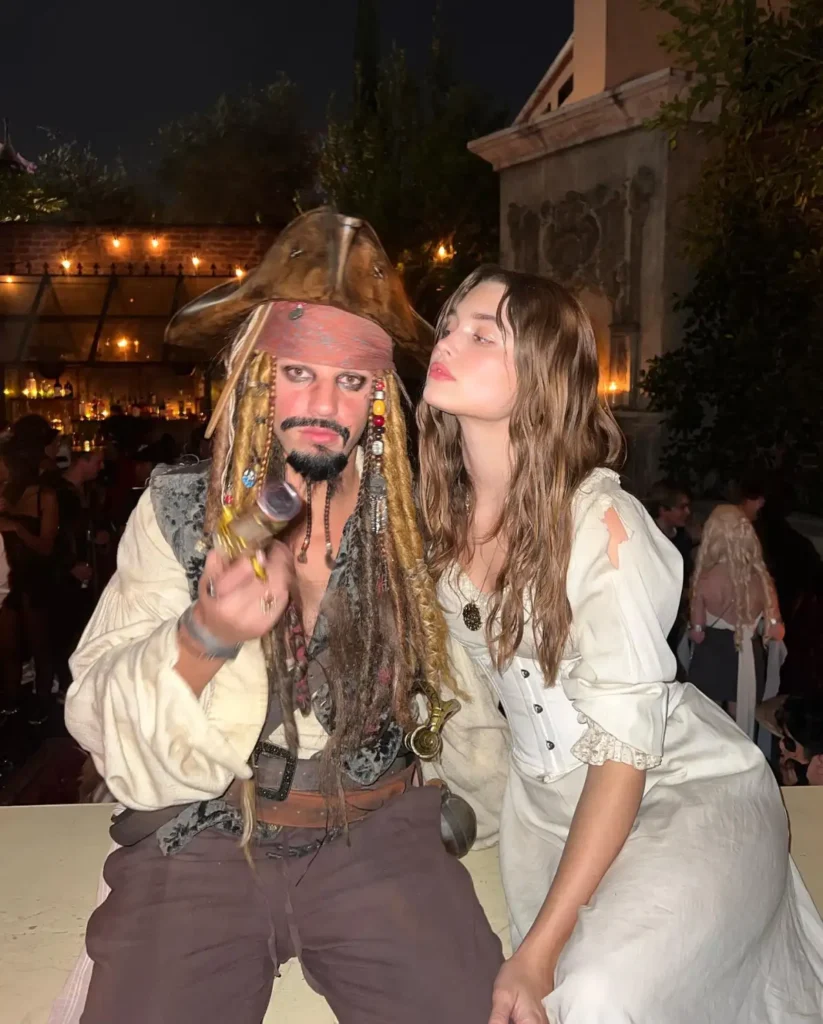 Jack Sparrow pirate couple Halloween costume with pirate hat, layered accessories and cream corset dress