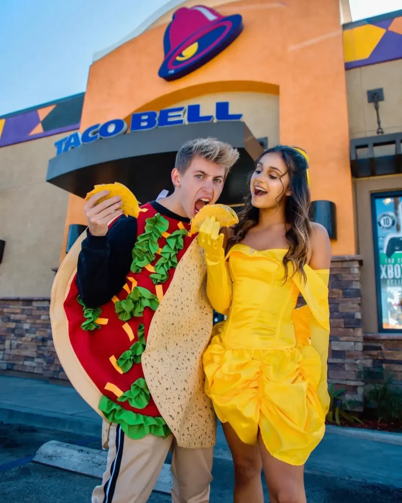 Funny Taco and Belle couple costume featuring a taco suit and bright yellow Belle-inspired dress.