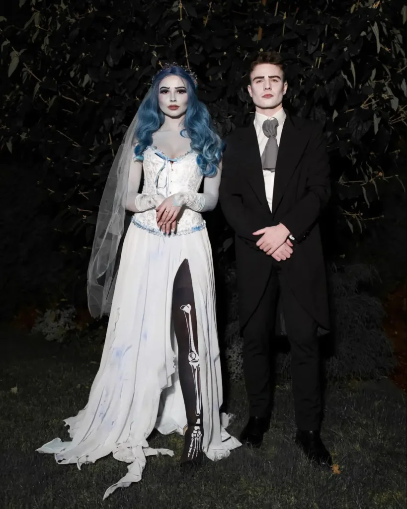 Emily and Victor couple Halloween costume with blue bridal makeup, white dress and black suit