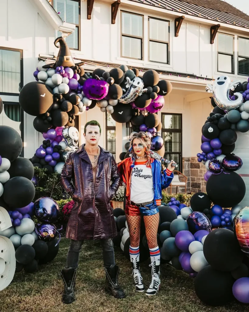 Joker and Harley Quinn couple Halloween costume with red blue outfit, green hair and character makeup